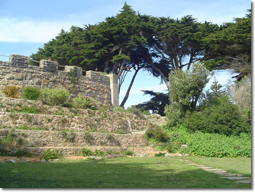 A photograph of the stairway into the castle-like rocky promontory in Sutro Heights Park in San Francisco, California.  Image copyright © Philip W. Tyo 2007
